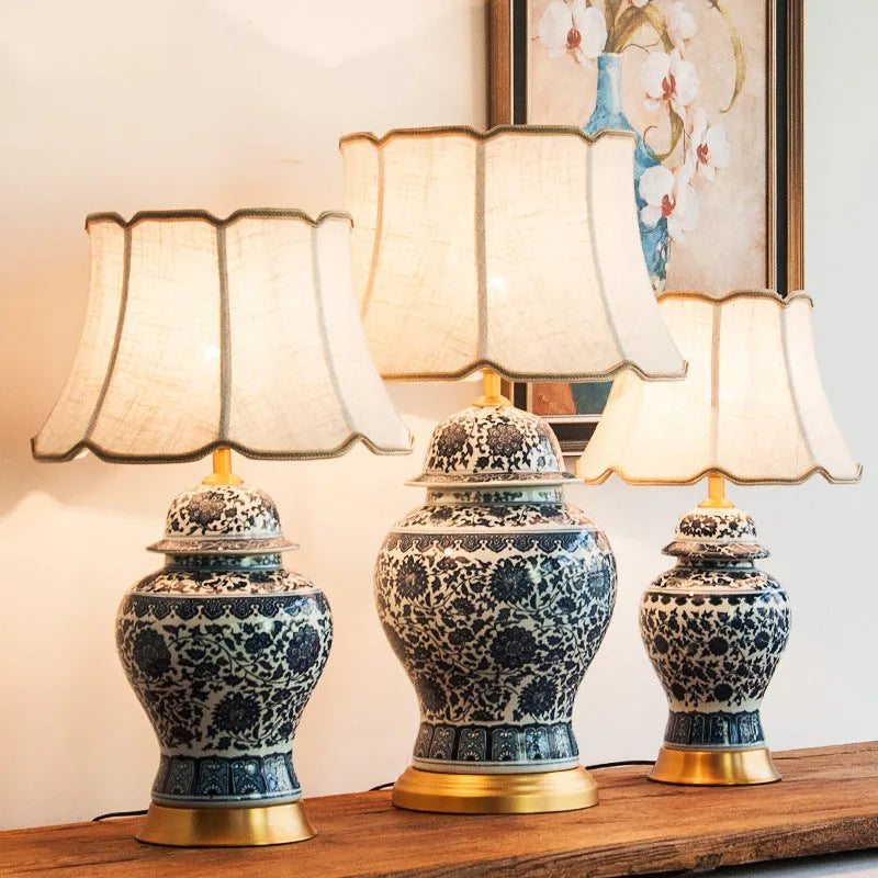 Blue and white porcelain Chinese style table lamp with ceramic base and cloth shade.