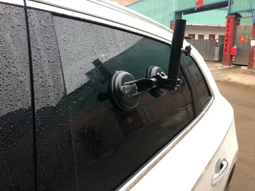 Black off-road car glass sucker mount with round rubber suction cup on ABS plastic base