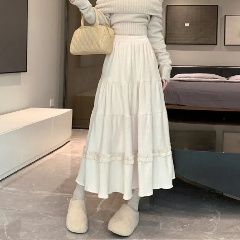 Korean style corduroy A-line midi skirt with elastic waistband in milky white colour