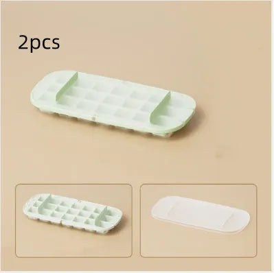 Food-grade plastic high capacity ice cube tray with grid and stored ice shovel in blue colour.