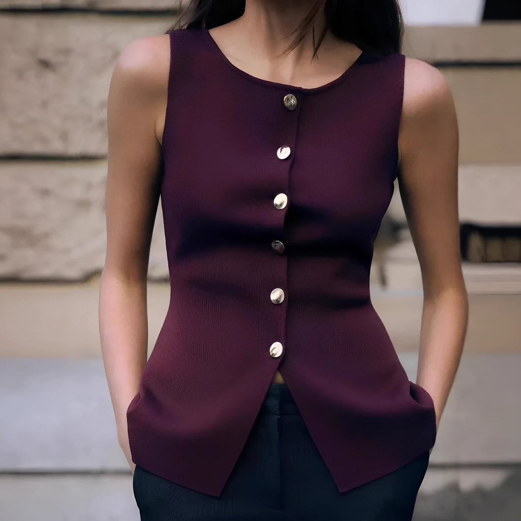 Slim-fit dark red viscose vest with gold buttons and a 3D textured pattern.