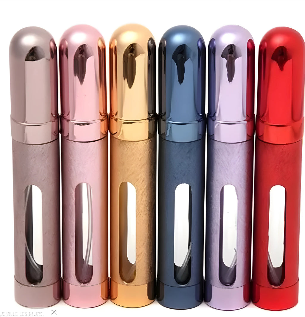 Slim 12ml aluminium travel perfume bottle with glass liner in choice of six colours including blue, gold, and pink.