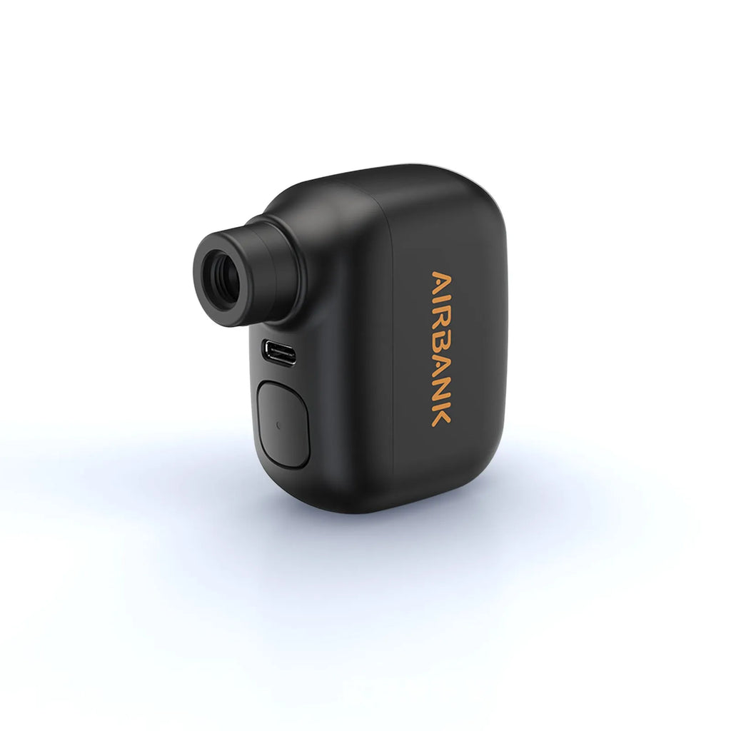 Black mini electric bike pump with USB charging cable and waterproof storage bag for portable bicycle tyre inflation