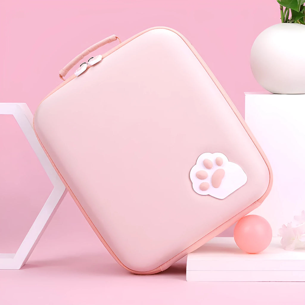 Pink Nintendo Switch storage bag with cat claw design holding game cards