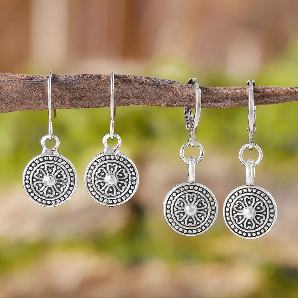 Geometric round earrings with distressed ethnic print in zinc alloy with electroplated finish