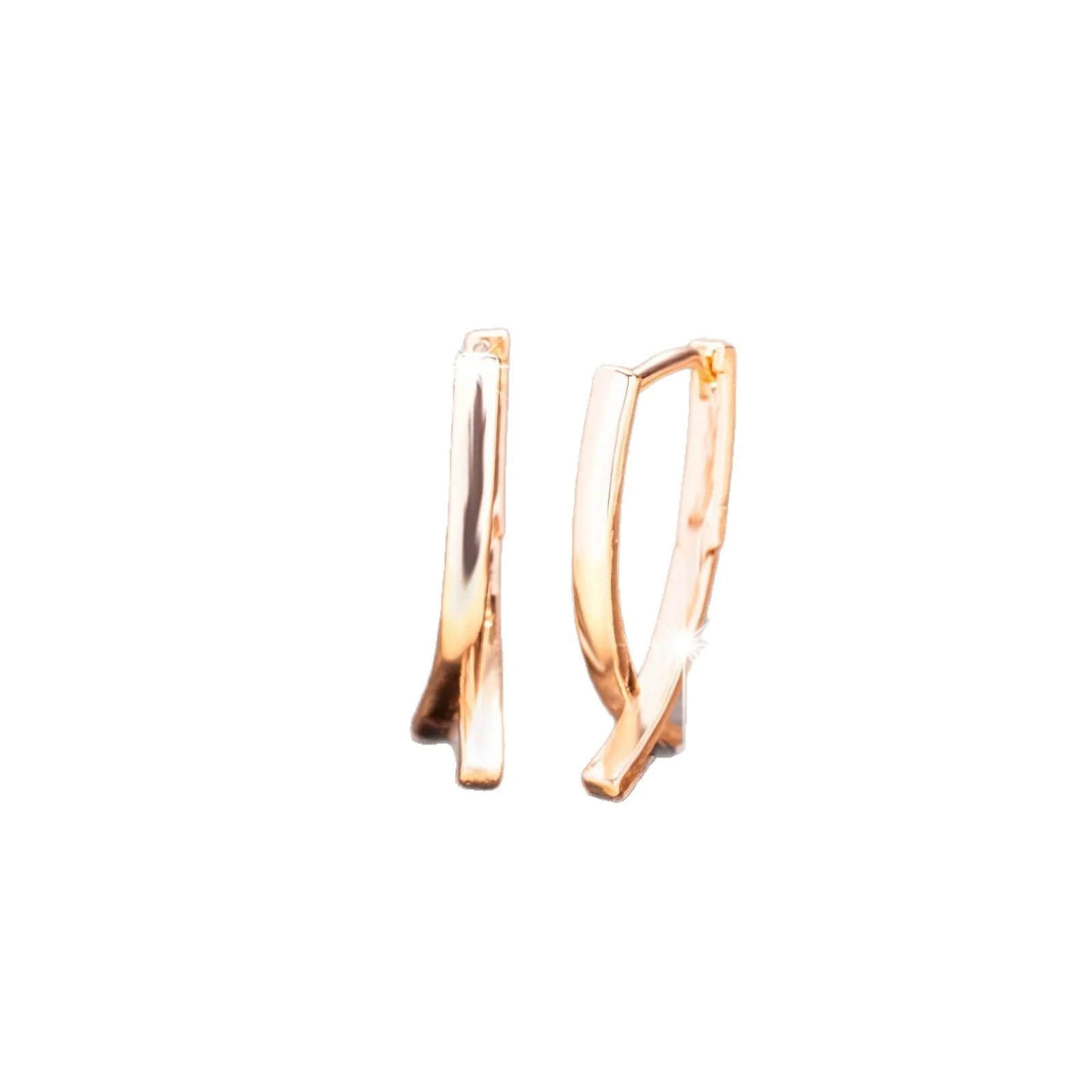 Rose gold cross shaped earrings on copper base with light luxury finish