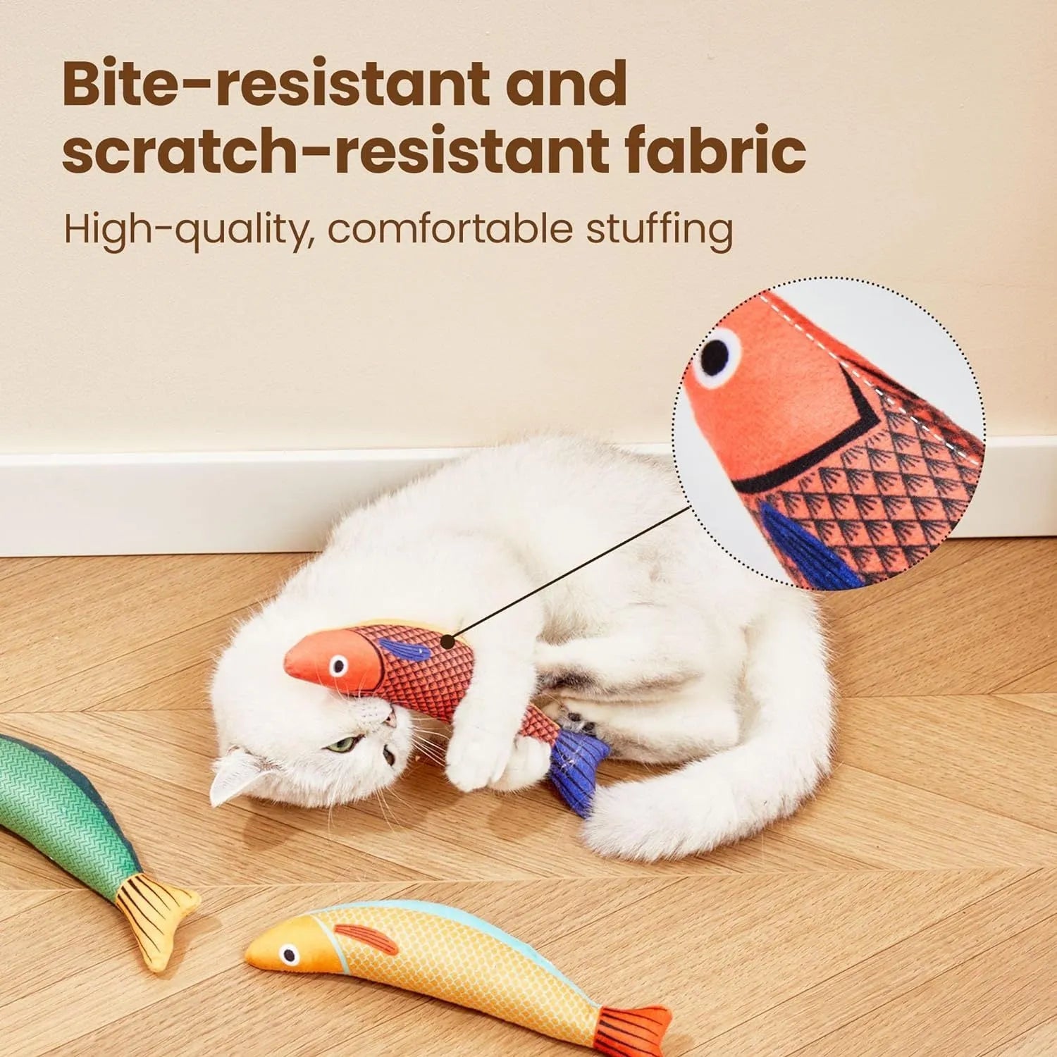 Green fish-shaped cat kicker toy with organic catnip filling and crinkle sound feature