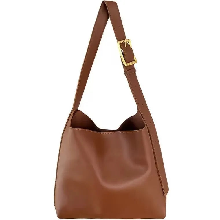 Women's soft PU shoulder bag with swing threads detail in black or brown colour