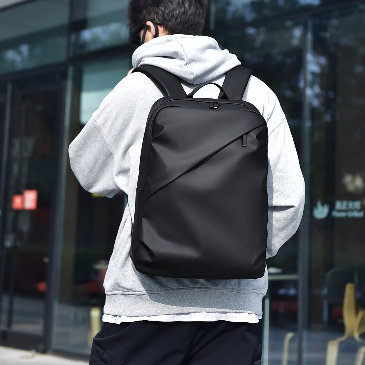 Large waterproof black PU backpack for men with computer compartment