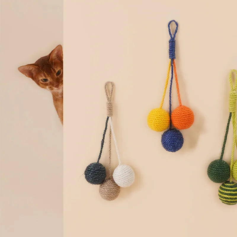 Cat teaser stick toy set with four bite-resistant elements including catnip balls in blue, green, red, yellow colours.