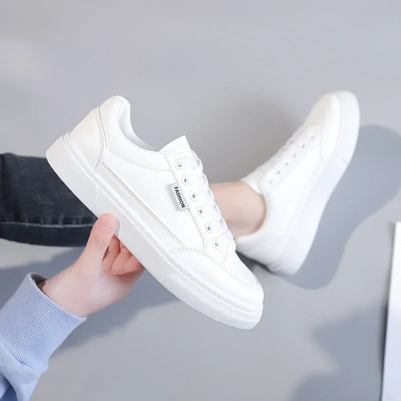 Korean-style women's low-top sneakers in white or brown with artificial PU upper.