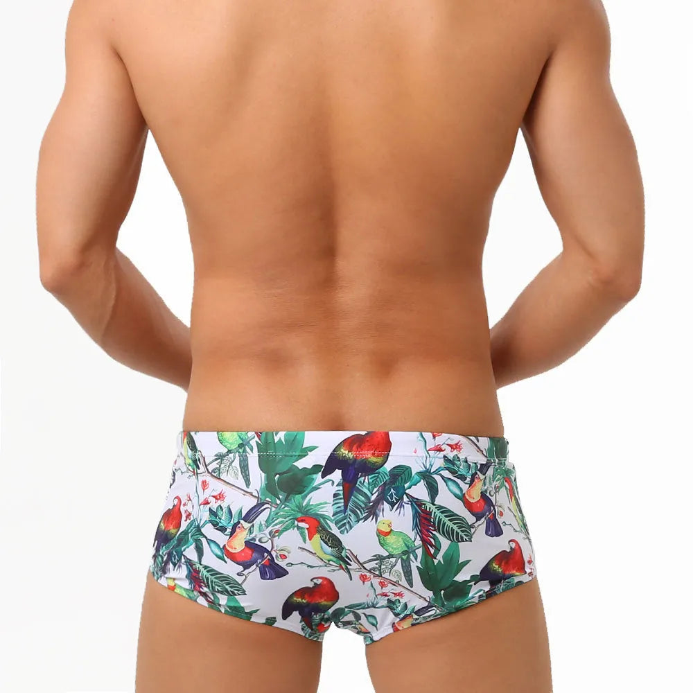 Men's floral bird print swimming trunks in nylon boxer brief style on size chart