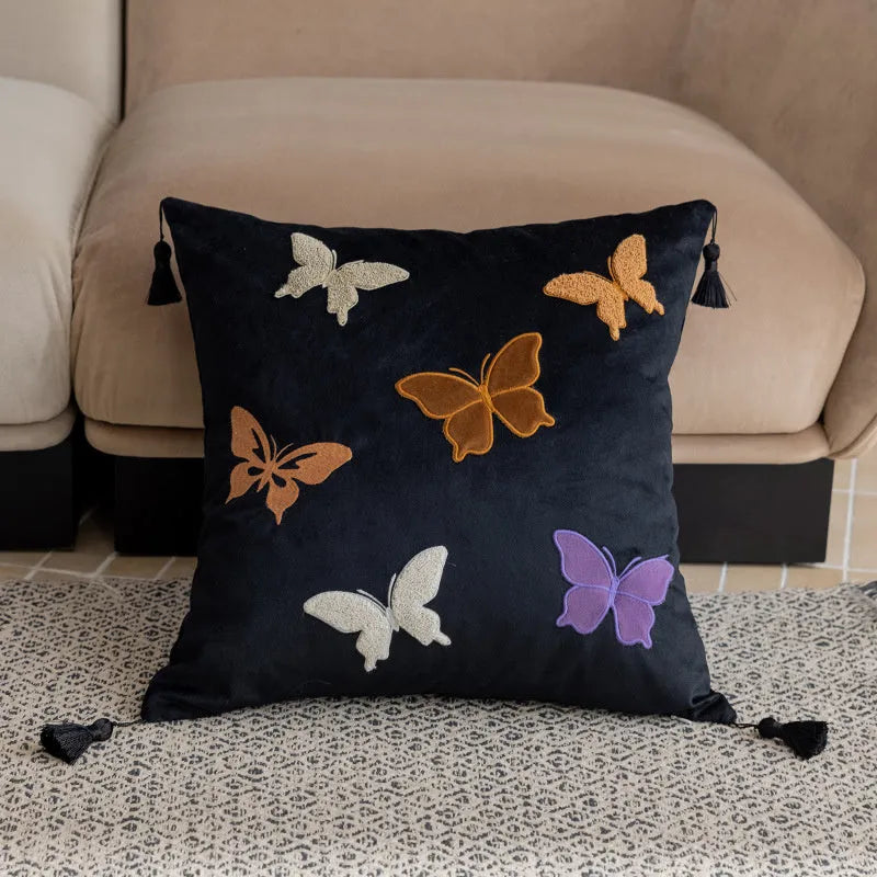 Square embroidered cushion with butterfly floral pattern in Chinese style, shown in beige colour.