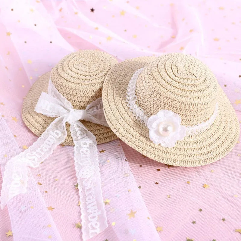 A colourful, handmade paper hat with a bowknot for a dog or cat on a white background.