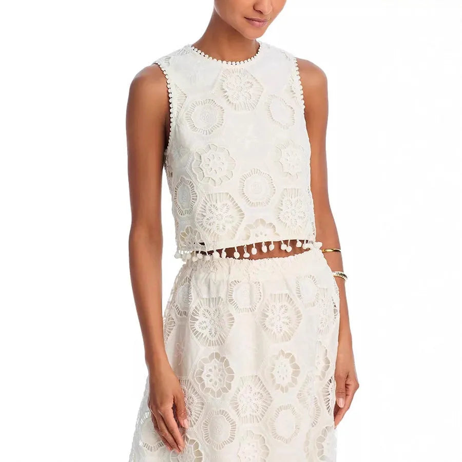White women's two-piece suit set with embroidered sleeveless top and long skirt in retro style