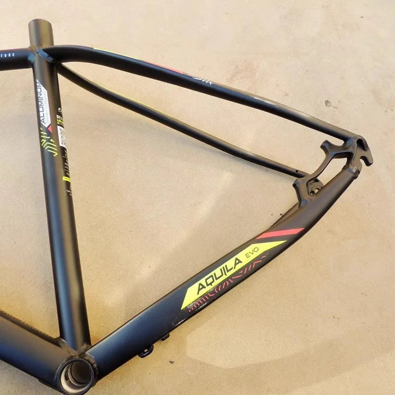 Black Green 29-inch aluminium mountain bike frame with internal cable routing and disc brake mount.