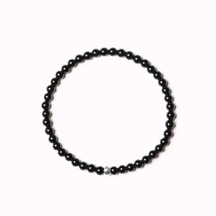 Geometric cut surface black agate bracelet with 4mm obsidian, blue san, and black agate beads