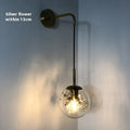 Modern glass wall-mounted bedside lamp in silver or gold finish
