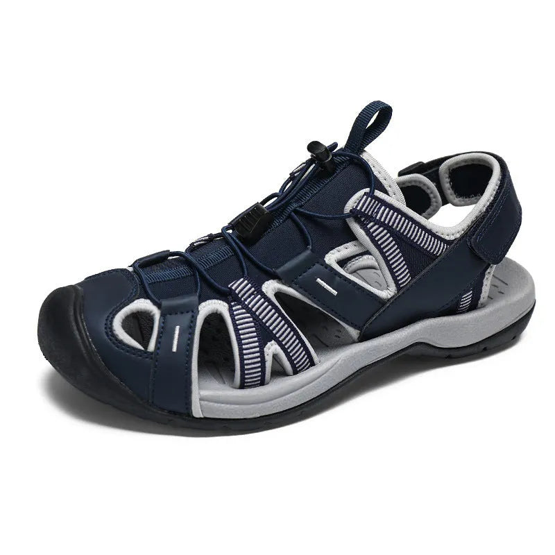 Men's blue mesh sports shoes with velcro closure and rubber sole on outdoor surface