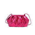 Women's black PU leather shoulder bag with hair clip fastening and crossbody strap showing internal phone and document compartments