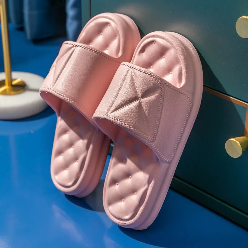 Pair of soft EVA bathroom sandals with a textured non-slip sole, shown in a choice of colours.