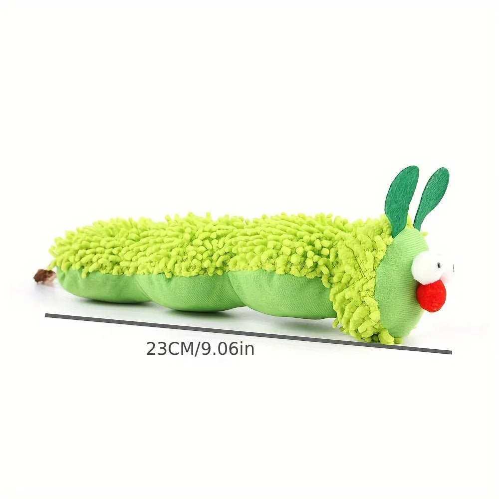 Green plush interactive cat toy pillow with moving LED tail, showing dimensions 24×11×5 cm