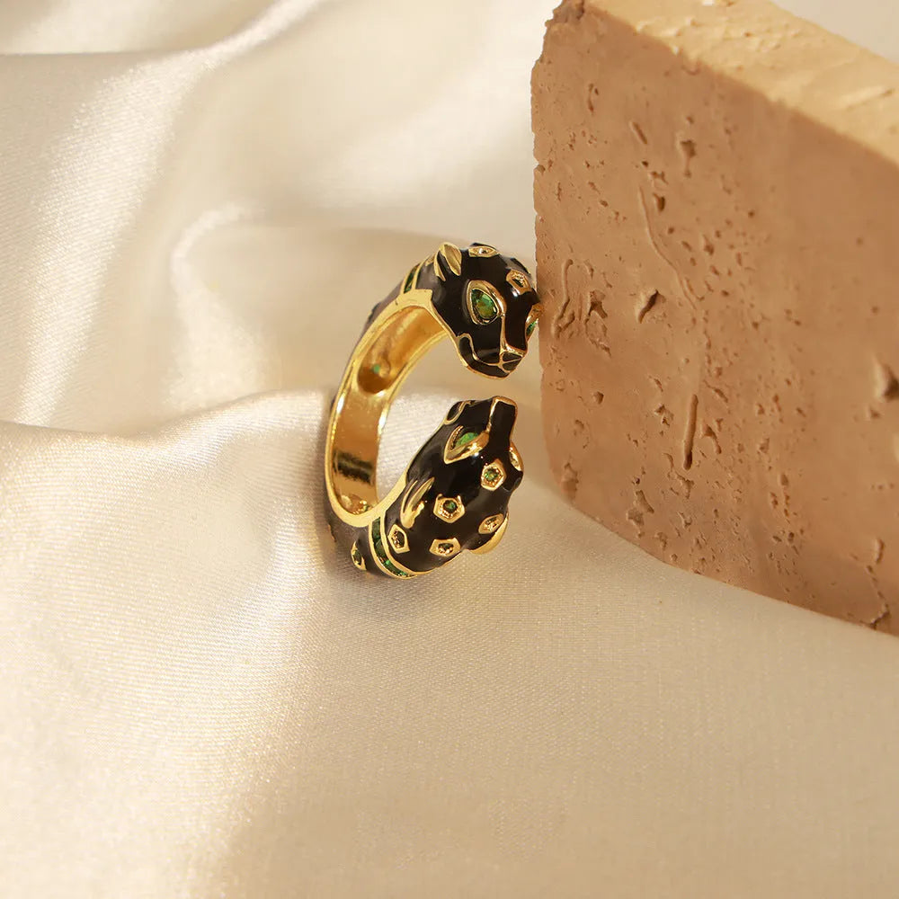 Copper geometric open ring with black cheetah electroplated pattern, size 7
