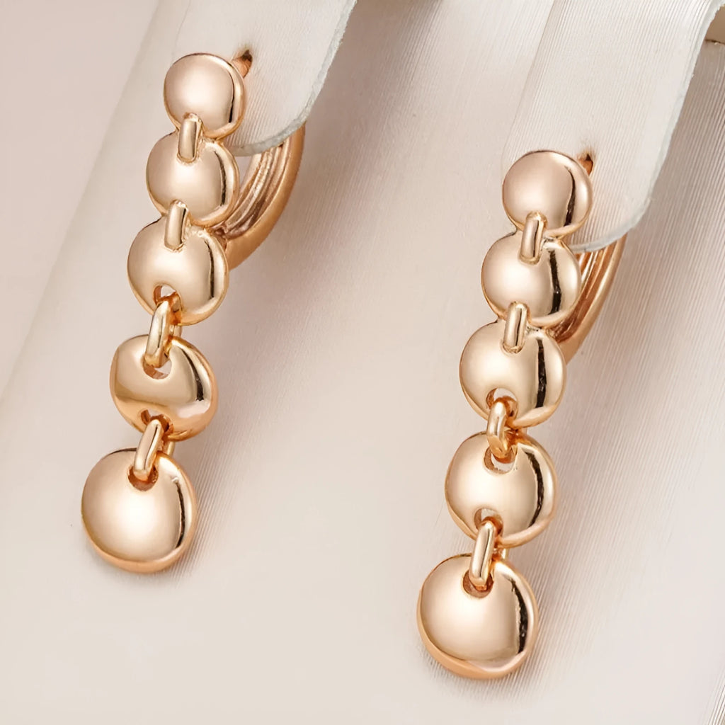 Gold retro woven copper circle earrings with round shape and long drop design