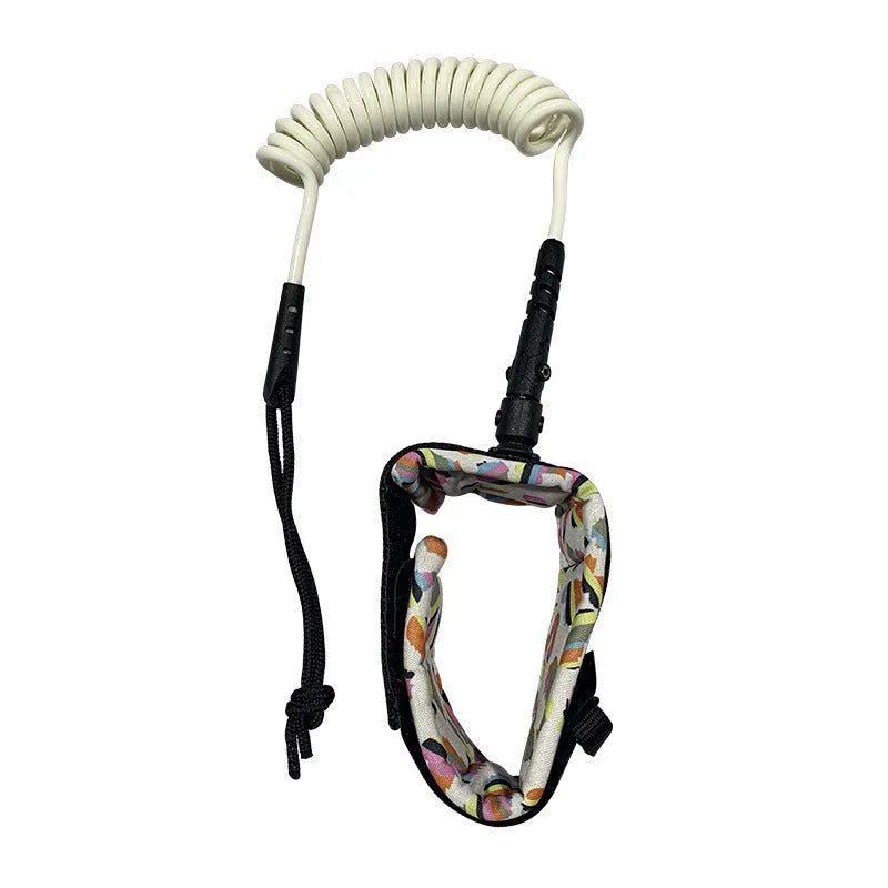 Surfboard hand holding rope showing elastic construction and connection hardware