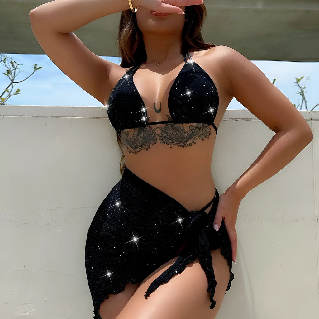 Black three-piece bikini swimsuit with matching top and shorts