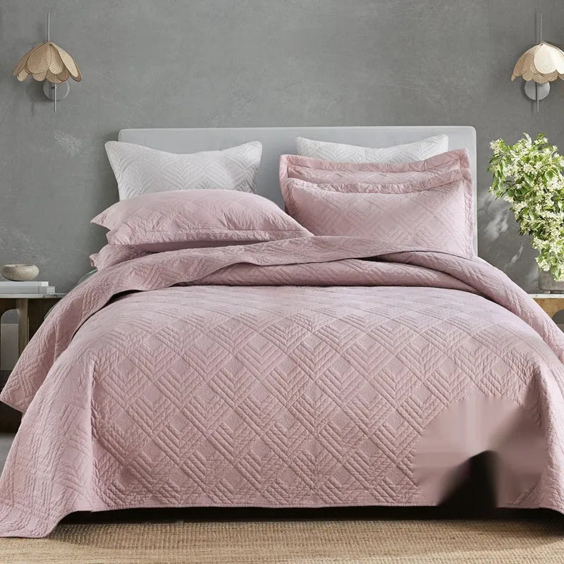 Pure cotton bedding set with damascus pattern showing embroidery details and quilted finish on bed