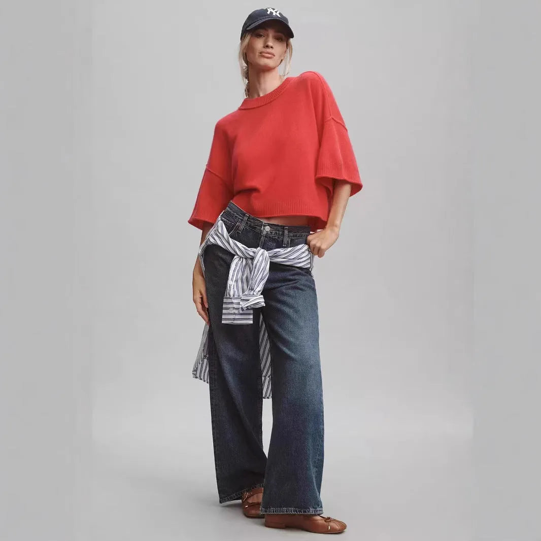 Red short sleeve viscose t-shirt with a cropped, exposed navel hem on a mannequin.