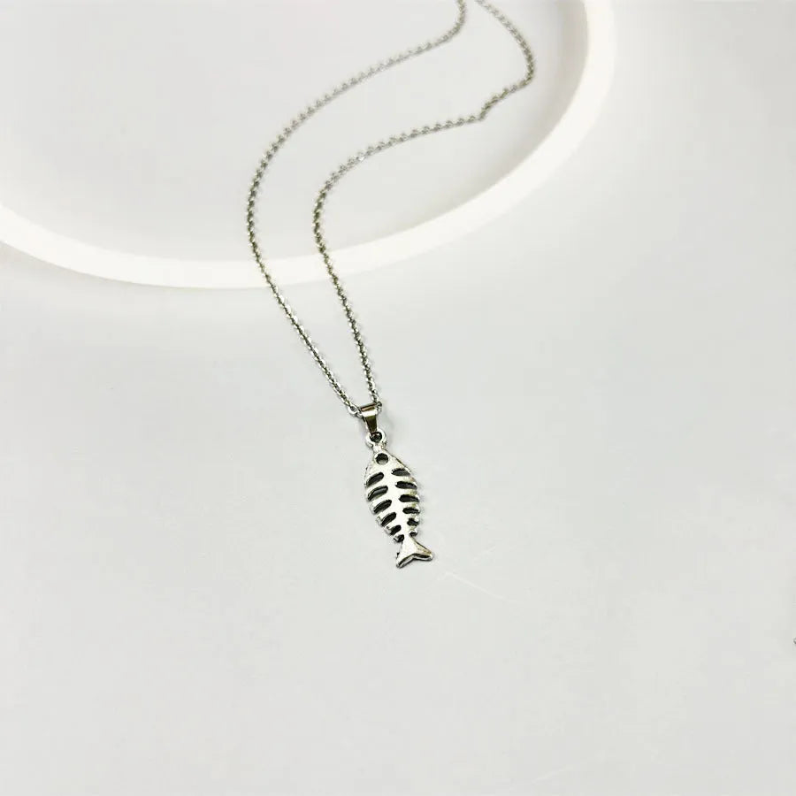 Women's retro-style fishbone pendant necklace and matching earrings set on an O-shaped chain.