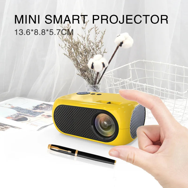 M24 portable mini projector in gold colour with compact 190mm design and AV cable