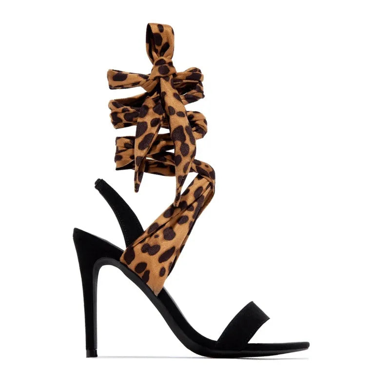 Light brown women's high heels with leopard print and cross straps on an 8cm stiletto heel