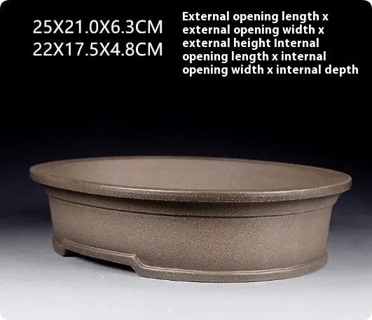Handmade antique oval bonsai flower pot in purple sand clay, showing dimensions.