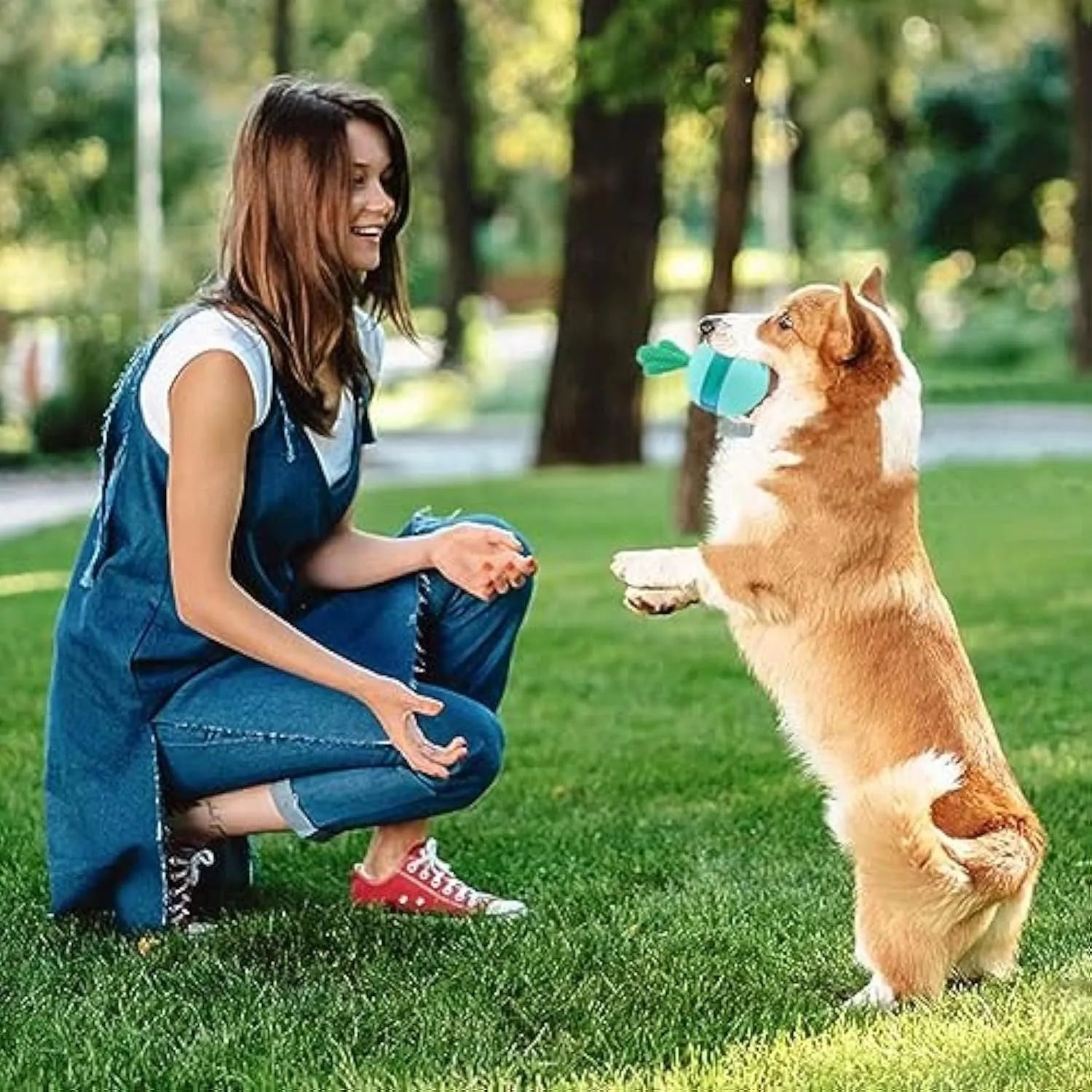 Blue interactive treat dispensing dog puzzle ball for medium large dogs with durable rubber construction