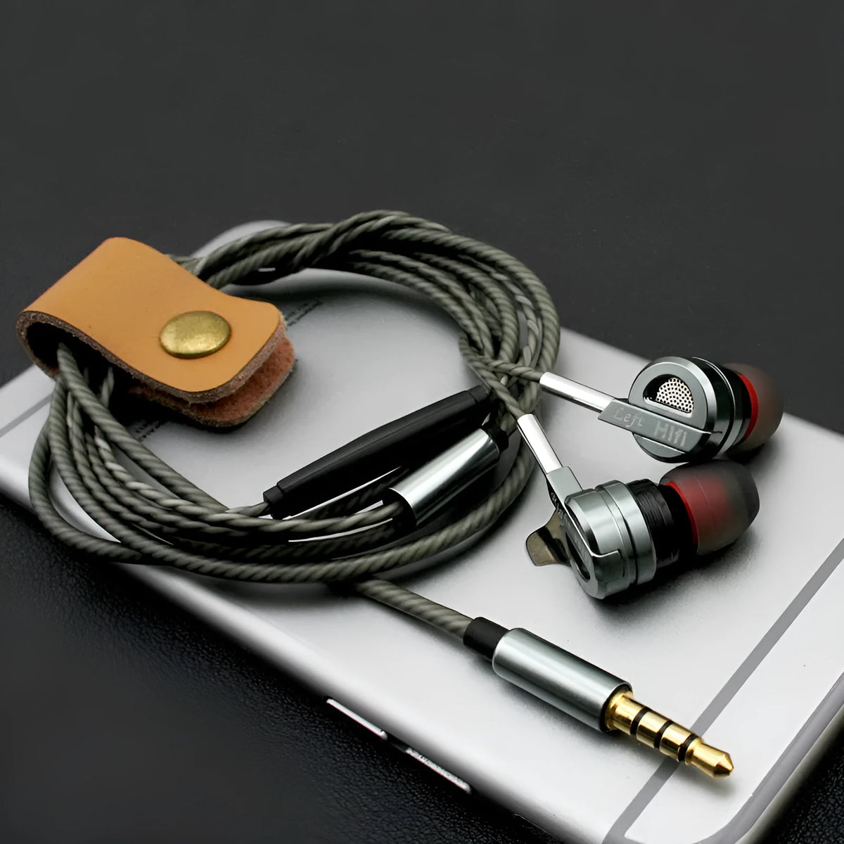 Black or silver metal in-ear HIFI headphones with inline microphone and controls on cable.