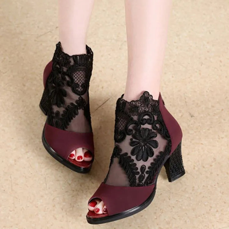Women's black lace gladiator sandals with square high heel and peep toe design
