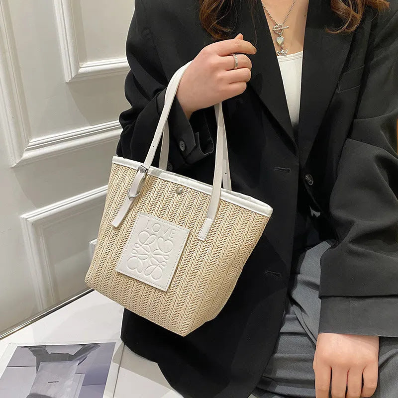 Straw woven women's shoulder bag in European retro style with three-dimensional pocket