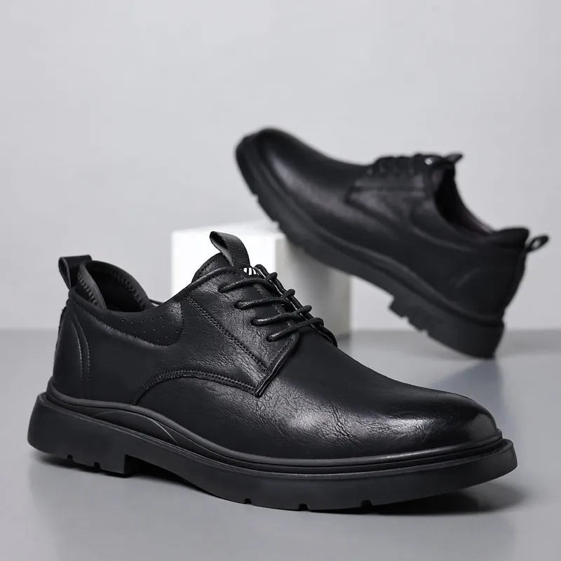 Men's black leather sneakers with rubber sole and sewing line detailing on two-layer cowhide upper