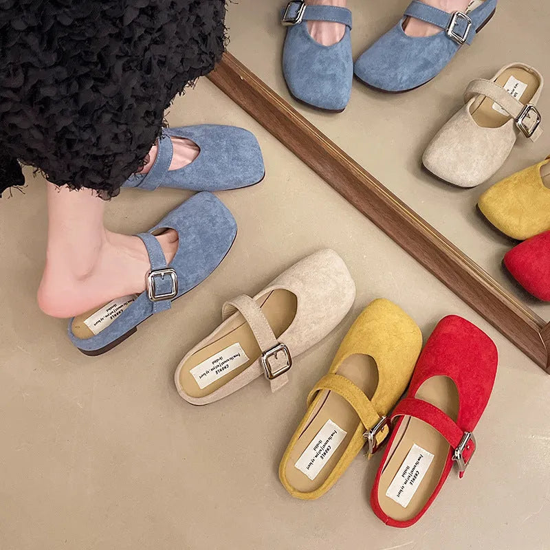 Women's flat closed toe half slipper in apricot colour with square toe and rubber sole.