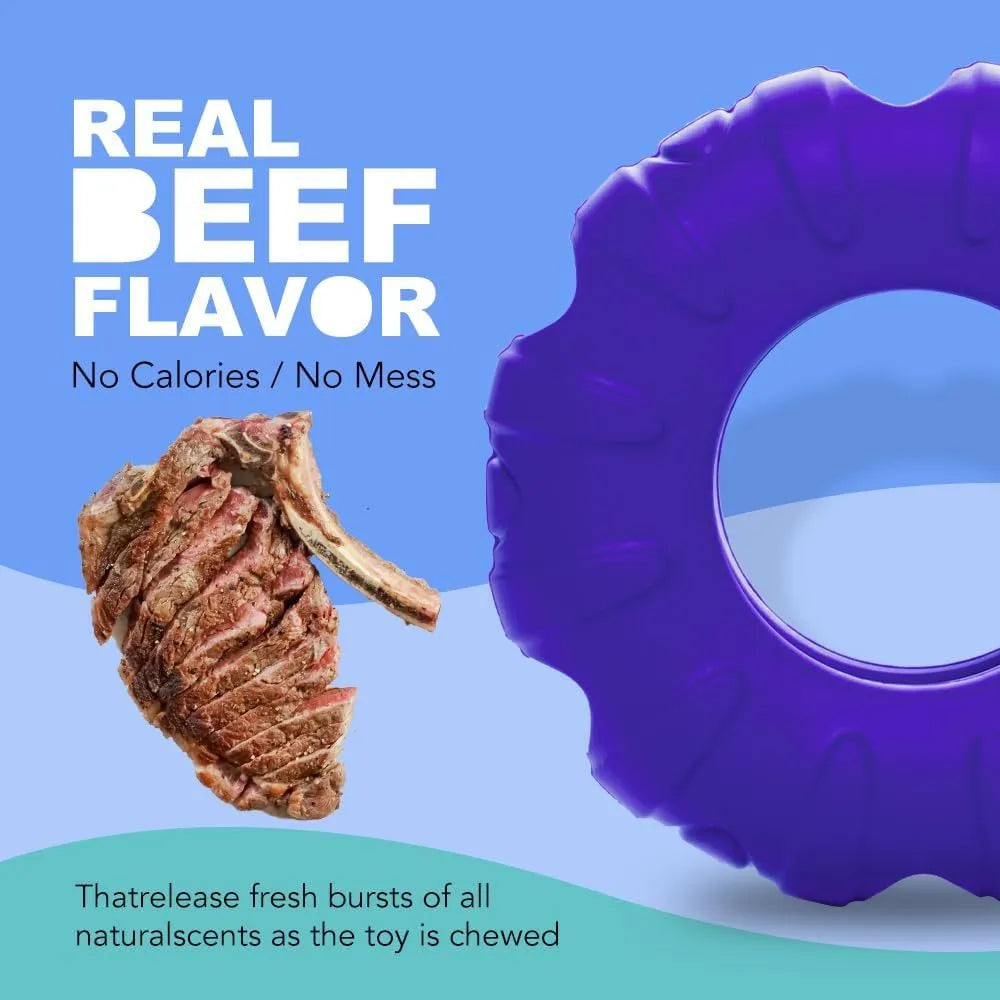 Beef-flavoured red rubber tyre dog chew toy with oval openings for treat dispensing