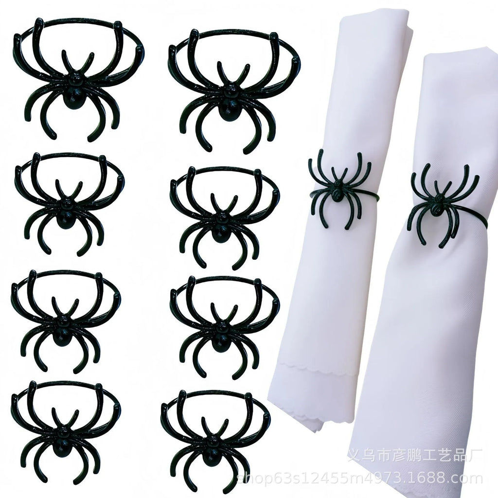 Six black spider-design alloy napkin rings for Halloween table settings