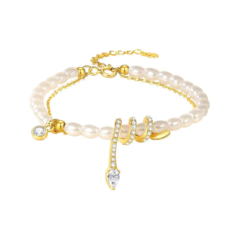 Pearl snake bracelet in 925 silver with geometric beaded design and electroplated gold finish