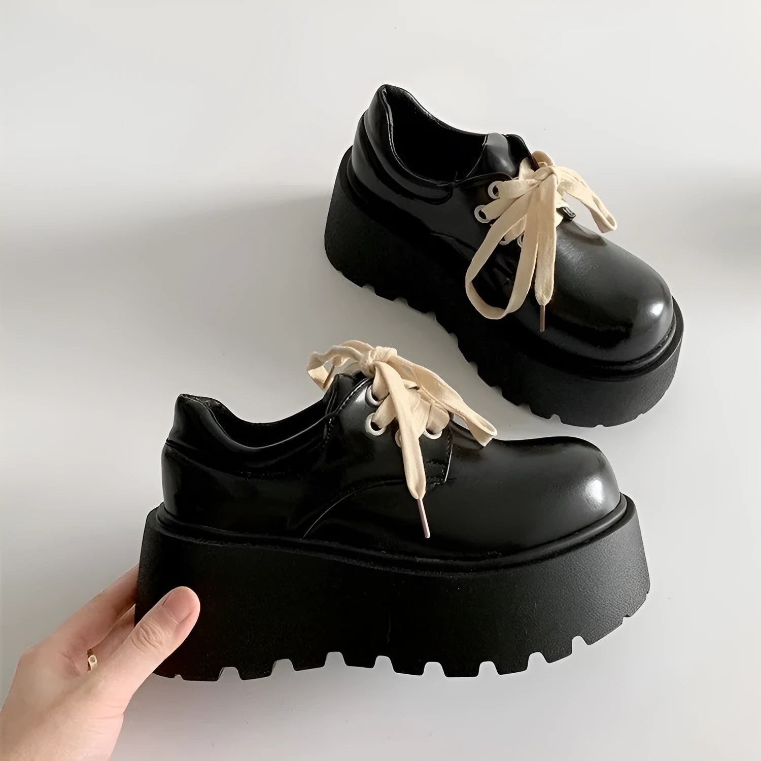 Black women's lace-up shoes with English muffin heels and round toe