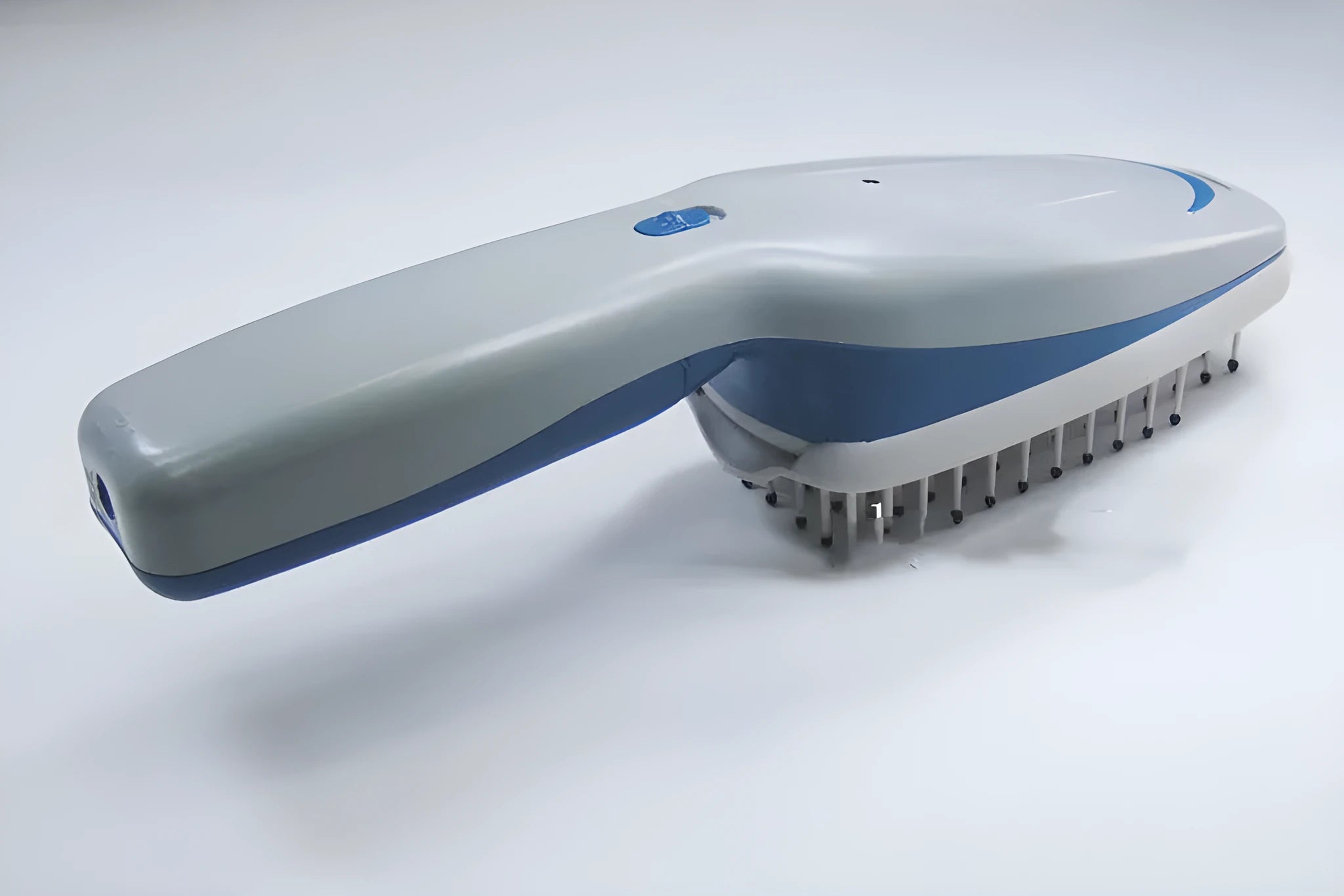 White pet grooming ion comb with a removable brush head, showing 78 teeth and a one-key switch.
