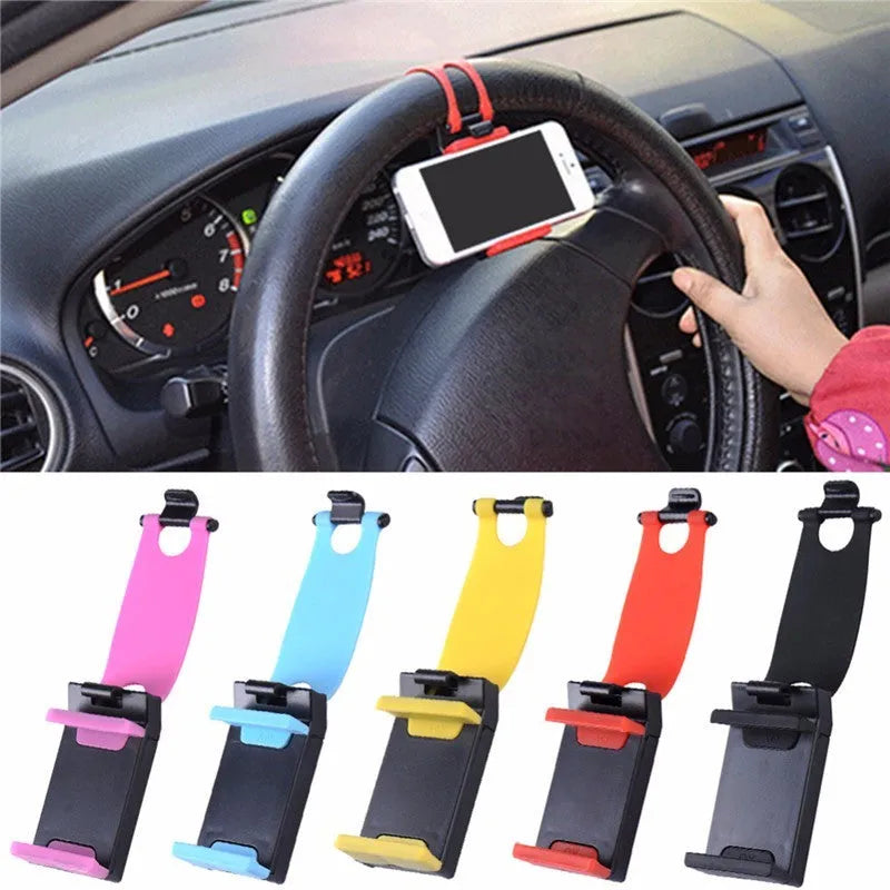 Black steering wheel phone holder mounted showing elastic clip and silicone phone padding