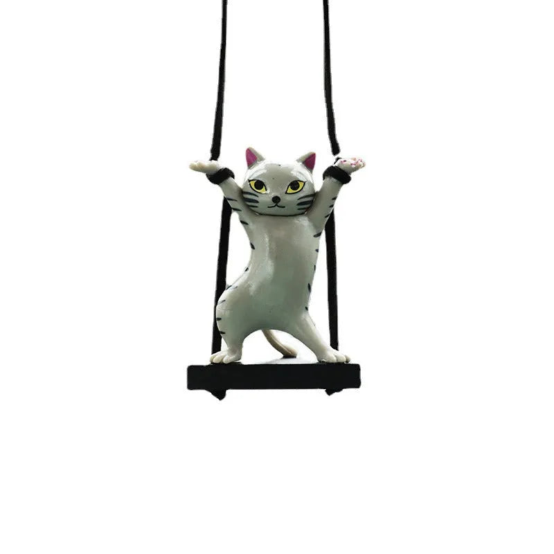 Cartoon-style resin cat pendant car ornament with adjustable rope in colour options including black, white, floral, grey, and brown.