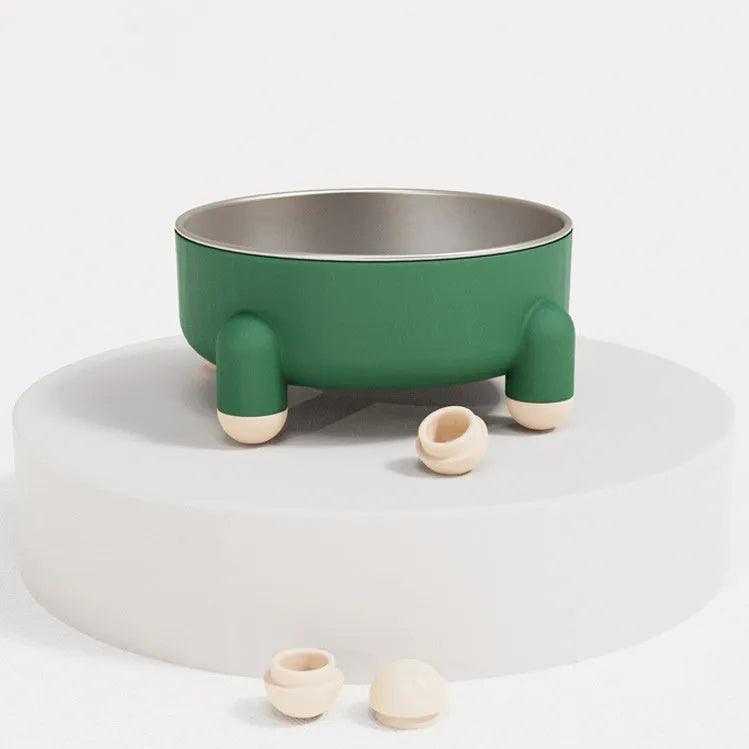 Green non-slip stainless steel pet food bowl with a high foot, shown on a floor.